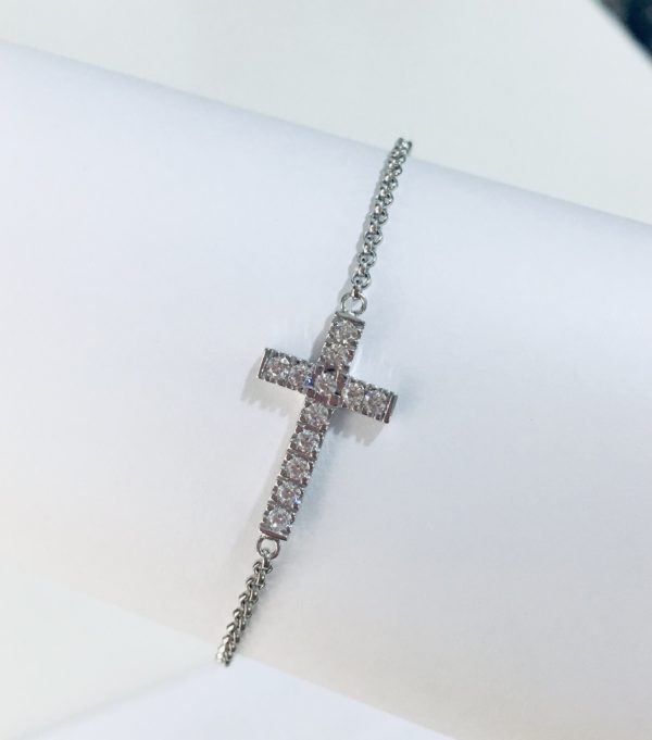 Stylish Cross Bracelet in Sterling Silver with white gold plating.