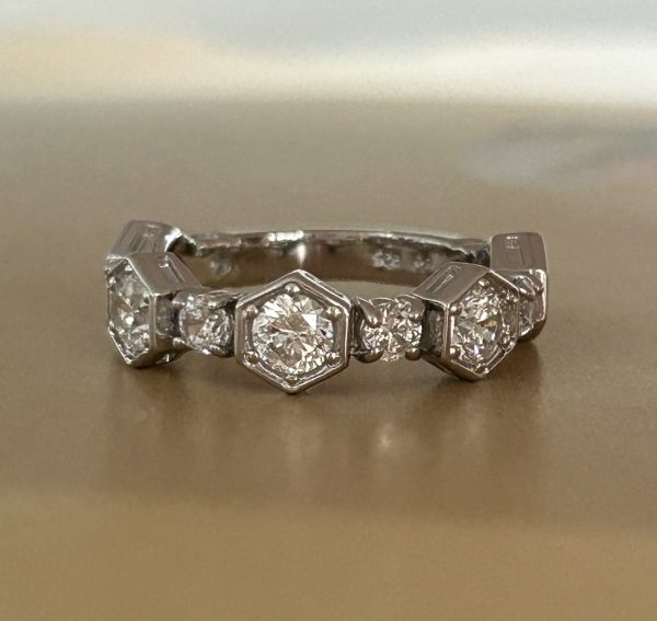 3/4 Eternity Band ring with hexagon and prong-set lab-created diamond simulants in sterling silver, available in rhodium, yellow gold, and rose gold plating.